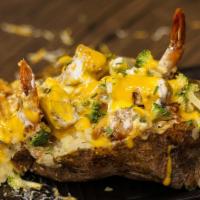 Shrimp & Chicken Loaded Potato · Baked Potato loaded with shrimp, chicken, broccoli and cheese