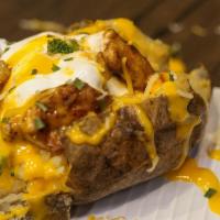 Chicken Loaded Potato · Baked Potato loaded with chicken, broccoli and cheese