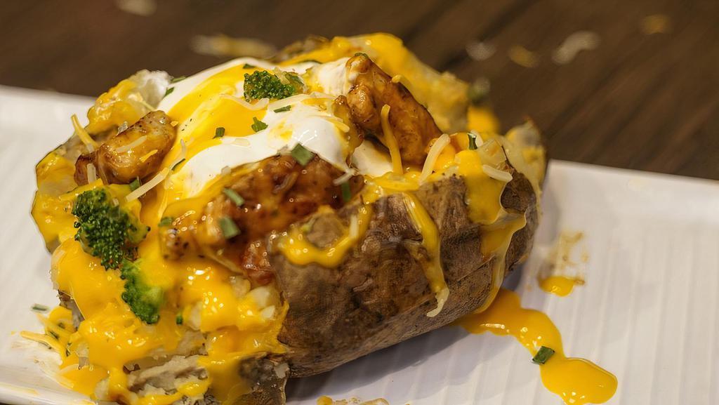 Chicken Loaded Potato · Baked Potato loaded with chicken, broccoli and cheese
