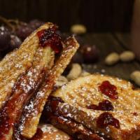 Grilled Pb&J · 2 pieces (Strawberry or Grape Jelly with powdered sugar)