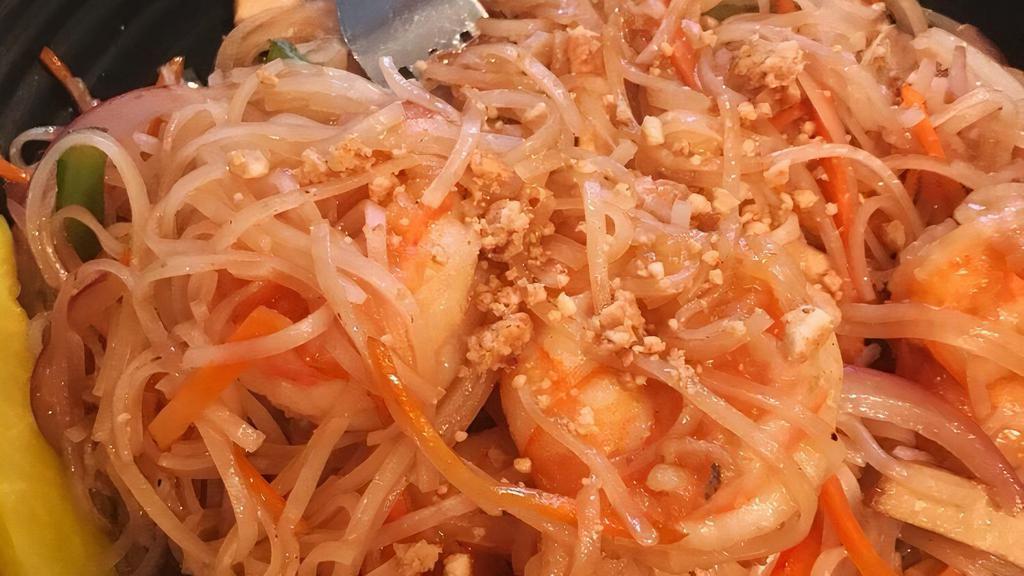 Pad Thai · Stir-fried rice noodle with eggs, tofu, Thai basil, peanut, bean sprouts & tamarind sauce.