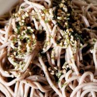 Zaru Soba · Cold buckwheat noodles topped with dried seaweed flakes, with sweet wasabi dipping sauce.