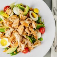 Chicken Cobb Salad · Grilled chicken breast, sliced avocado, shredded cheddar cheese, bacon and sliced egg, serve...