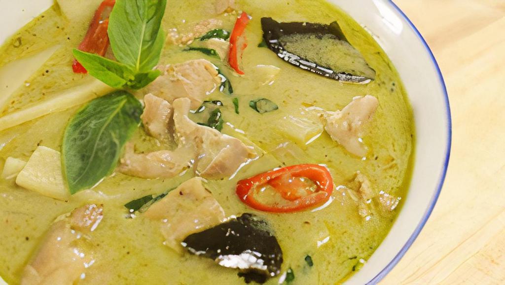 C-2. Green Curry · Green curry paste, coconut milk with  bamboo shoot, string bean , pepper and basil.