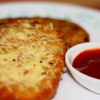 Hash Browns · Fried shredded potatoes.