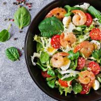 Mediterranean Shrimp And Crab Meat Salad · Large shrimp and crab meat salad over our garden salad served with salad dressing simply del...