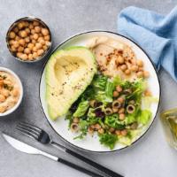 Garden Salad With Hummus · Chickpeas home style made with garlic, olive oil, lemon, tahini sauce and garden salad.