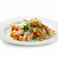 Beef Caesar Salad · Beef gyro chopped served over Caesar salad with parmesan cheese and Caesar dressing.