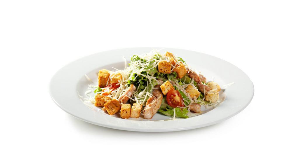 Beef Caesar Salad · Beef gyro chopped served over Caesar salad with parmesan cheese and Caesar dressing.