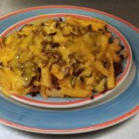 Loadded Fries · Fries topped with fresh bacon and melted cheddar.