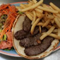 Beef Or Chicken Gyro Platter · Strips of seaoned meat on pita served woth greek salad and tsatsiki