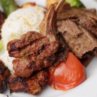Mixed Grill Kebab · Combination of chicken, lamb, lamb chop, meatball and gyro kebabs, served with grilled veget...