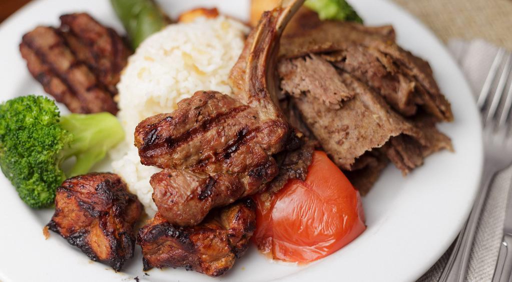 Mixed Grill Kebab · Combination of chicken, lamb, lamb chop, meatball and gyro kebabs, served with grilled vegetables and rice.