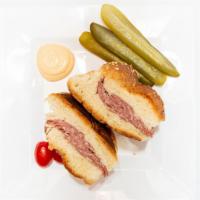 Beef Salami · On mezonos roll cherry tomatoes, pickle and dressing.