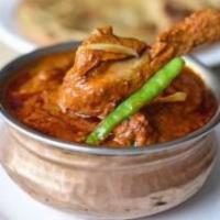 Lamb Rogan Josh · Tender lamb pieces cooked with onion and tomato gravy and traditional kashmiri spices.