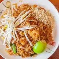 Pad Thai (Shrimp, Chicken Or Tofu) · Hot & Spicy. Stir-fried Thai noodles with egg, bean sprouts, dry tofu & topped with ground p...