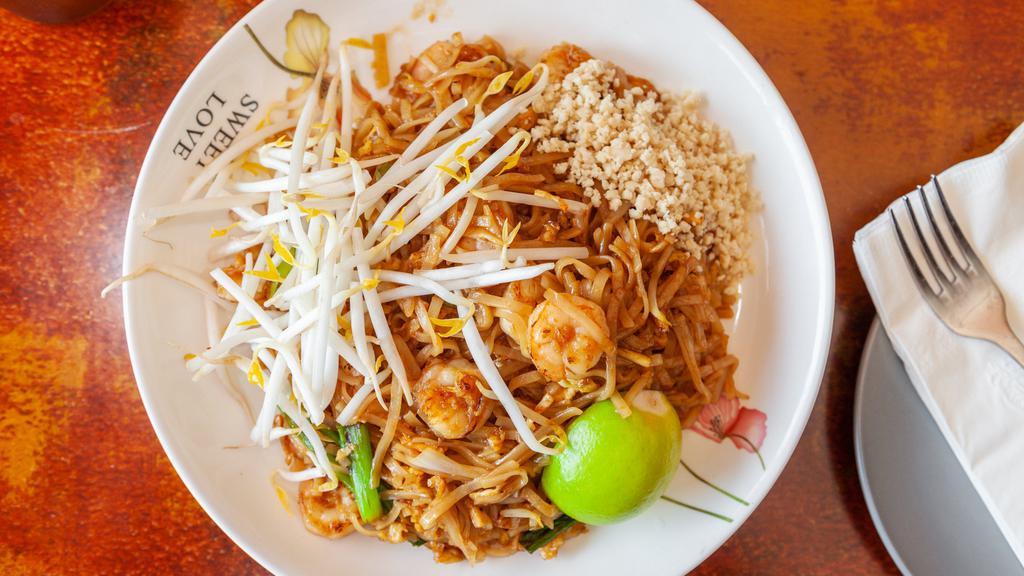 Pad Thai (Shrimp, Chicken Or Tofu) · Hot & Spicy. Stir-fried Thai noodles with egg, bean sprouts, dry tofu & topped with ground peanuts.