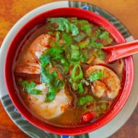 Spicy Shrimp (Tom Yum Goong) · Hot & Spicy. Thai spicy & sour soup with shrimp, lemon grass, mushroom, pepper
& lime juice.