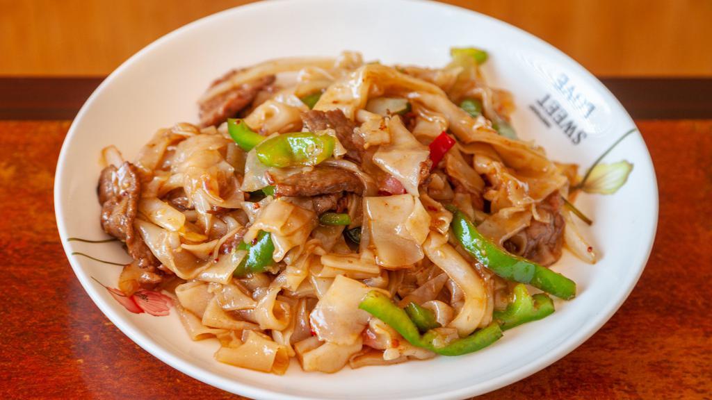 Drunken Noodles (Pad Ki Mao) · Hot & Spicy. Spicy stir fried board rice noodle with basil, onion & bell peppers.