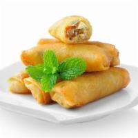 Vegetable Spring Rolls · Golden fried spring rolls with sweet and chilli sauce.