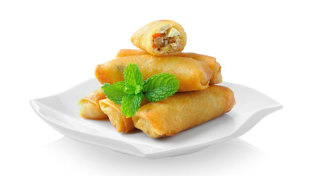 Vegetable Spring Rolls · Golden fried spring rolls with sweet and chilli sauce.