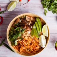 The Garlic Vegetable Pad Thai · Chef's famous rice noodles with chopped garlic, vegetables, tofu, bean sprouts and ground pe...
