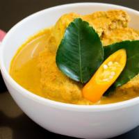 Thai Yellow Curry · A traditionally prepared yellow curry with bamboo shoots and coconut milk.