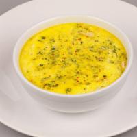 Hot & Sour Vegetable Soup · Classic creamy sweet corn soup with vegetables.