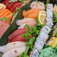Sushi And Sashimi Combo · Six pieces sushi and nine pieces sashimi with tuna roll.