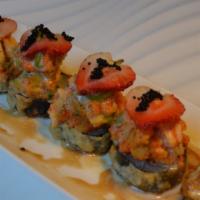 Lady Bugs Roll · Crab tempura inside and spicy shrimp with avocado and a slice of strawberry and juicy coconu...