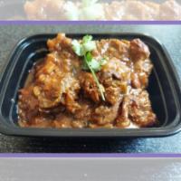 Brown Stew Chicken (Small) · Dark and white meat chicken sautéed in a brown sugar molasses base with rosemary, green pepp...