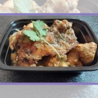 Baked Barbecue Chicken (Large) · Dark and white meat chicken sautéed in a West Indian curry, rosemary, green pepper and escel...