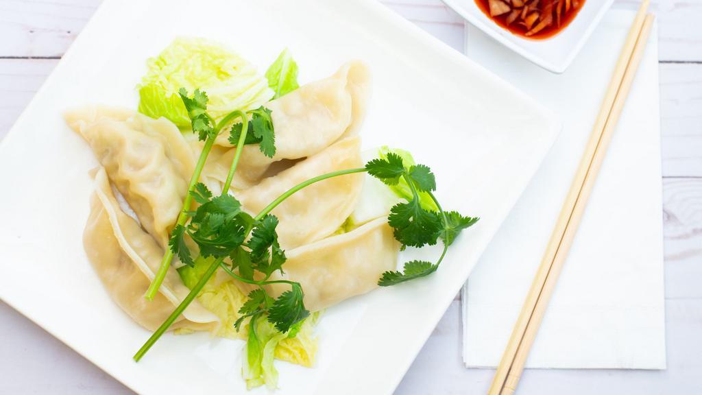 Fried Or Steamed Dumpling (5 Pc) · Filled with cabbage and scallions. Served with homemade soy dumpling sauce.