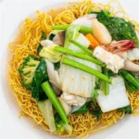 Crispy Or Soft Egg Noodles Topped With Seafood & Mix Vegetables · Served with shrimp, fish balls, crab meat, and squids.