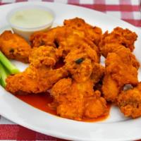 Buffalo Chicken Wings · 12 pieces half catering tray or full catering tray.