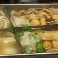 Fish Cake Soup · Skewered fish cake with udon noodles, tofu, boiled eggs jalapeño and assorted vegetables. Mi...