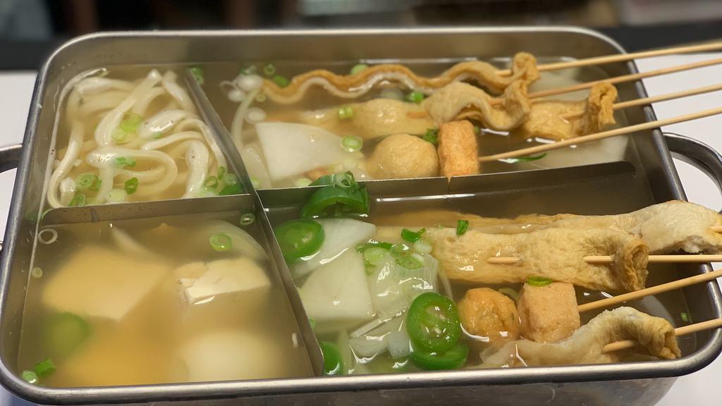 Fish Cake Soup · Skewered fish cake with udon noodles, tofu, boiled eggs jalapeño and assorted vegetables. Mild Spicy