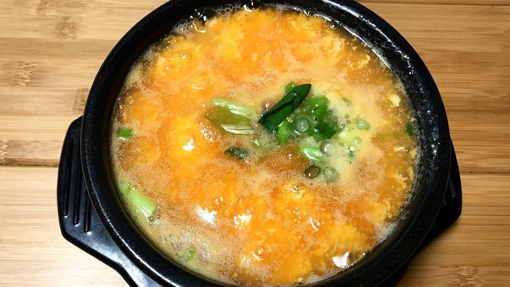 Seafood Egg Drop Soup · Egg drop soup with chopped seafood  and massage