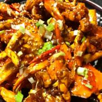 Spicy Crab · Fried crabs in sweet and spicy sauce.