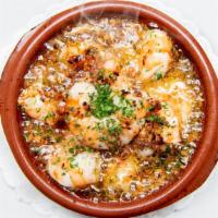 Gambas Al Ajillo · Shrimp in a sizzling garlic sauce