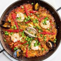 Paella De Mariscos · Paella with squid, shrimp, prawn, clams, monkfish and mussels