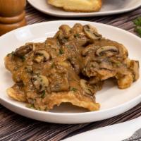 Chicken Marsala · Light floured and fried chicken breast with a delicious Marsala sauce