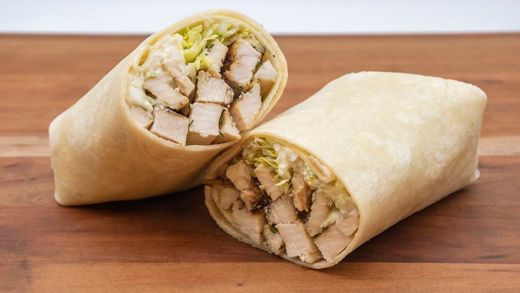 Grilled Chicken Caesar Wrap · Grilled chicken, romaine lettuce, Parmesan cheese and caesar dressing in a flour wrap.