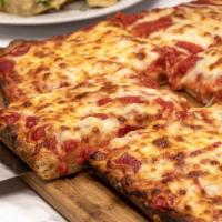 Sicilian Square (8 Slices) · Thick crust pan pizza topped with mozzarella & tomato sauce
