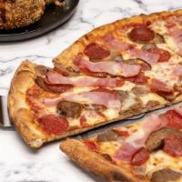 Meat Lovers Pizza · Tomato sauce, shredded mozzarella, meatballs, sausage, pepperoni and ham.