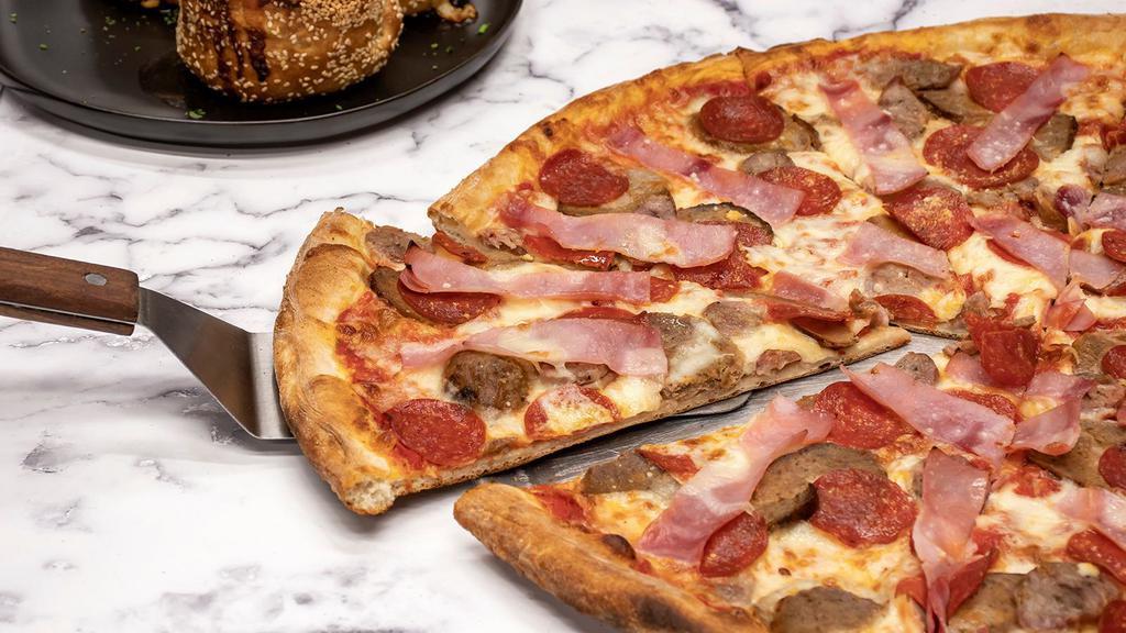 Meat Lovers Pizza · Whole pie topped with tomato sauce, shredded mozzarella, meatballs, sausage, pepperoni and ham.