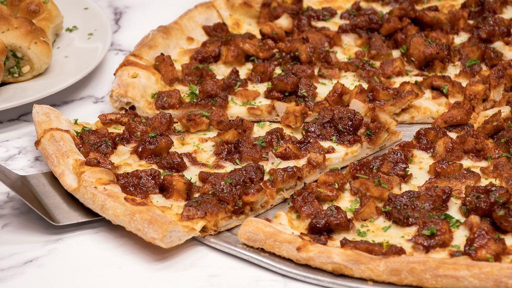 Bbq Chicken Pizza · Whole Pie topped with BBQ sauce, chicken cutlet and mozzarella.