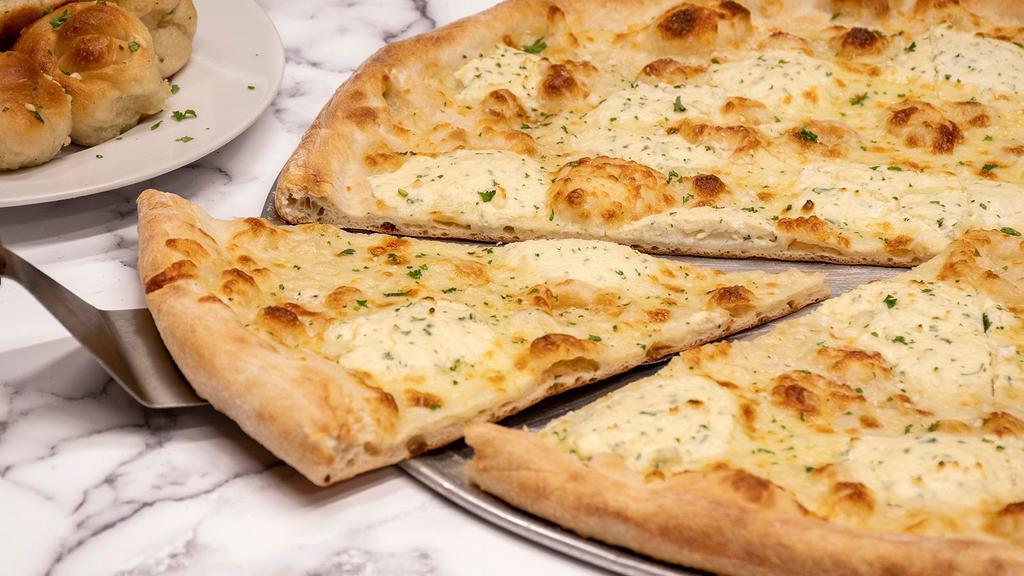 White Pizza Combo (Includes Your Choice Of 12 Garlic Knots, Garden Salad Or 12 Zeppoles) · Ricotta cheese and mozzarella.