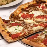 Eggplant Pizza · Whole pie topped with fried eggplant, ricotta & mozzarella cheeses and pizza sauce.