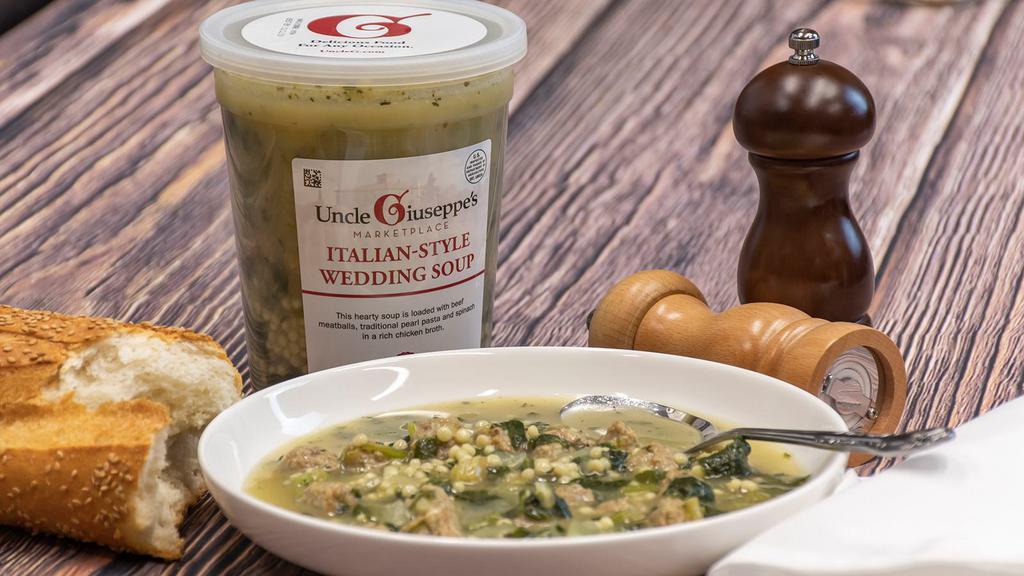 Italian-Style Wedding Soup · 1 Quart. This hearty soup is loaded with beef meatballs, traditional pearl  pasta and spinach in a rich chicken broth. *This item is delivered cold ready to heat and enjoy.